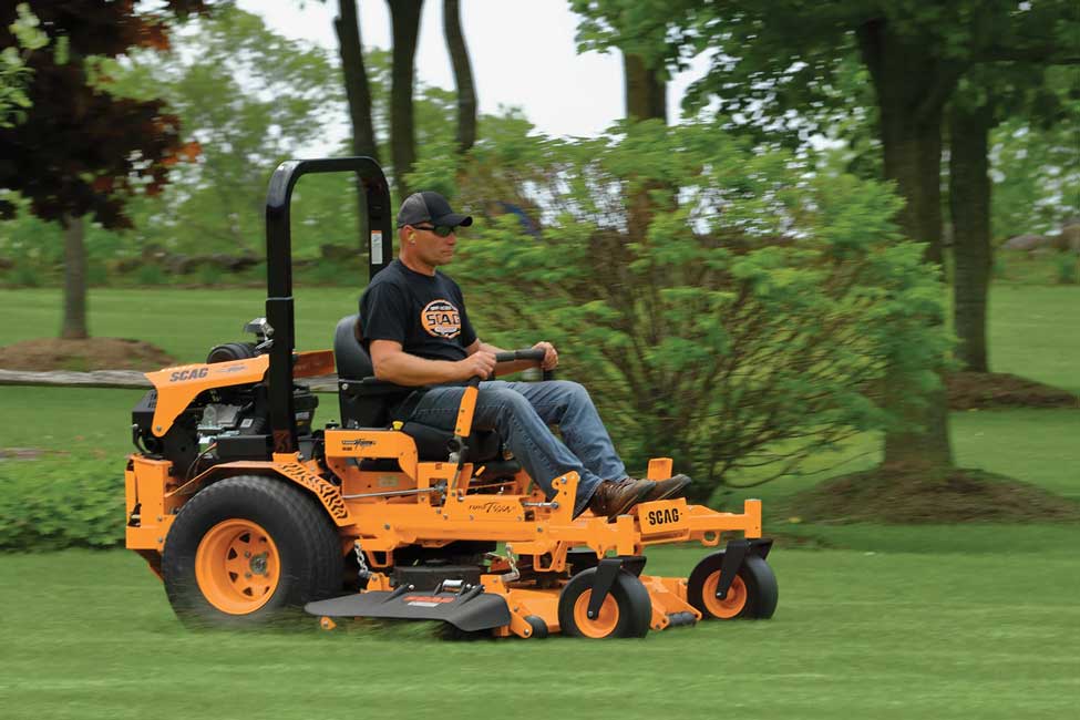 Man mowing grass, CSRA LawnCare provides mowing services to Augusta, Hephzibah, Grovetown, Evans, & North Augusta
